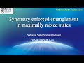 Symmetry enforced entanglement in maximally mixed states