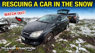 RESCUING A CAR THAT SLID OFF THE ROAD