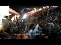 devotees singing and dancing at kamakhya temple of assam