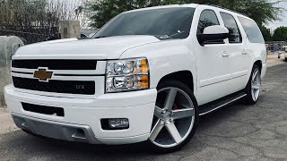 Suburban with Silverado HD front end on 2/4 drop 24s