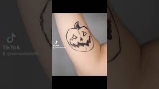 Spooky Halloween tattoo made into body art ( design created by Angelo Parente )