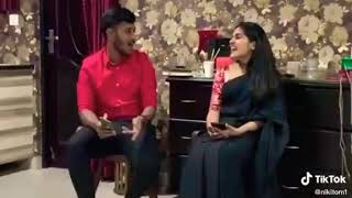 NivethaThomas Singing Song With Her Brother
