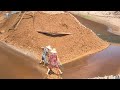 Barge unloading bauxite ore - hardworking female workers - Vlog of work on barge