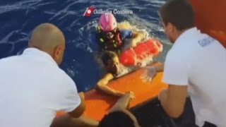 Lampedusa boat sinking: Migrants rescued from sea by Italian coastguard