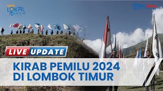 KPU Lombok Timur Gelar Kirab Pemilu 2024, Peserta Membentangkan Bendera dan Naik Bukit