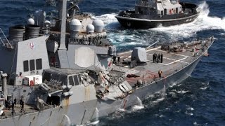 Officials probe cause of Navy ship crash