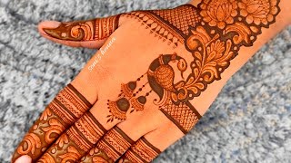 Royal peacock party henna design for back hand | Stylish back hand mehndi design