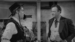 1962 L'uomo che uccise Liberty Valance  - Valance fa inciampare Rance mentre porta la bistecca a Tom