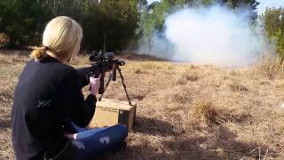 Blonde blows up a safe with tannerite and an M4