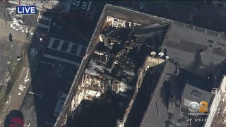2 dozen families displaced after massive fire destroys apartment building
