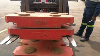 Proof load testing of a forklift by 2 tones to degrade it to a known safe working load.