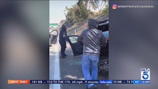 Driver robbed on L.A. freeway after intentional crash