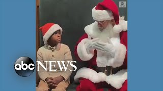 Santa uses sign language to communicate with deaf and hard of hearing children