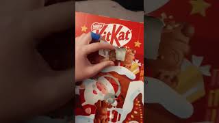 Opening kitkat advent calendar day 4