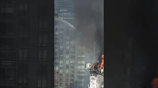 12 people were injured after a burning crane partially collapsed in NYC. #abc7ny #nyc #crane #fire