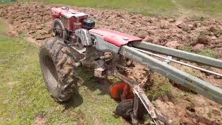 Plowing bulldozer Kubota Tractor