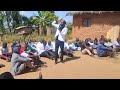 Rev. Aexander Kambiri preaching at the funeral service in Malomo Ntchisi