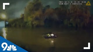 WATCH: Police rescue woman trapped in sinking car