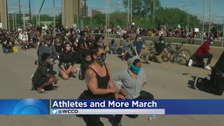 Protesters Take A Knee, Move Through Downtown Minneapolis