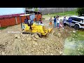 big rock unload by 5t truck and push by bulldozer 20p to remove the flood