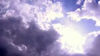 Sun over dark storm clouds - timelapse #06