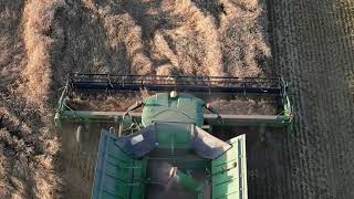 John Deere combine, grain field in southern Alberta - County of 40 Mile