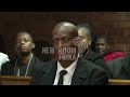 Police ballistics expert remains behind bars