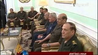 Egypt's president asserts authority over army