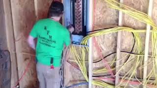Time lapse of making up a 225 Amp electrical panel at rough in.