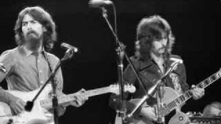Download Lagu George HarrisonEric Clapton While My Guitar Gently... MP3 Gratis