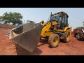 kirloskar jcb 3dx backhoe loading mud in swaraj 744 4wd and mahindra arjun 605 tractor