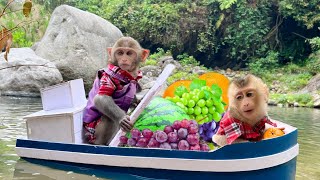 Bim Bim rowes a boat to pick fruit for baby monkey Obi