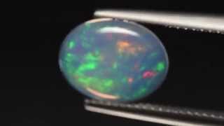 薄型大画面 遊色が大きくうねるのウェロオパール【1.36ct】