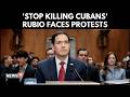 'Stop Killing Cubans!' Protester Interrupts Rubio During Tense Senate Hearing | N18G