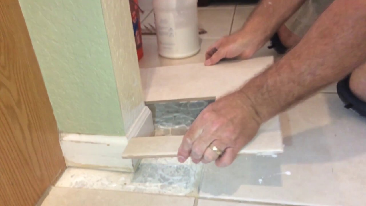 Re Glue A Loose Tile With Reptile Adhesive Youtube