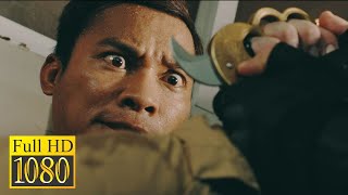 Tony Jaa and Iko Uwais vs an assassin in the movie Triple Threat (2019)
