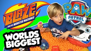 SURPRISE EGGS Paw Patrol + Blaze and Monster Machines Worlds Biggest Cheese Puff Surprise Egg Video