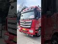 father and daughter drive truck together on the road