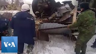 Emergency Workers at Kazakhstan Plane Crash Site