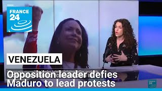 Venezuela's opposition leader defies Maduro to lead protests that end in confusing arrest claims