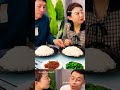 husband and wife eating food 62