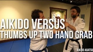 AIKIDO VS THUMBS UP TWO HANDS GRAB