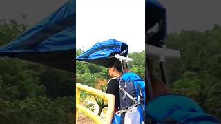 Hiking with bag retractable umbrella