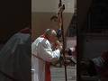 Pope Francis stands to kiss the cross during the Good Friday liturgy