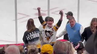 Hockey Fan Booed for Taking Puck from Kid