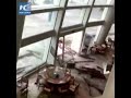 Sea water pours into dining hall of hotel