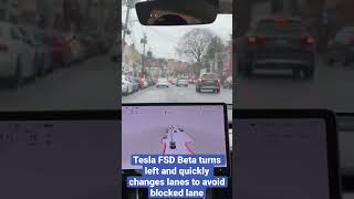 Tesla FSD Beta turns left and quickly changes lanes to avoid blocked lane