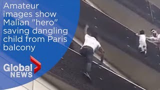 ​Mali migrant scales Paris building to rescue dangling child