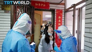 Millions in China under lockdown as virus spreads anew