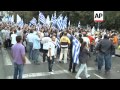 Police confront protesters as violence flares at demos over Merkel visit